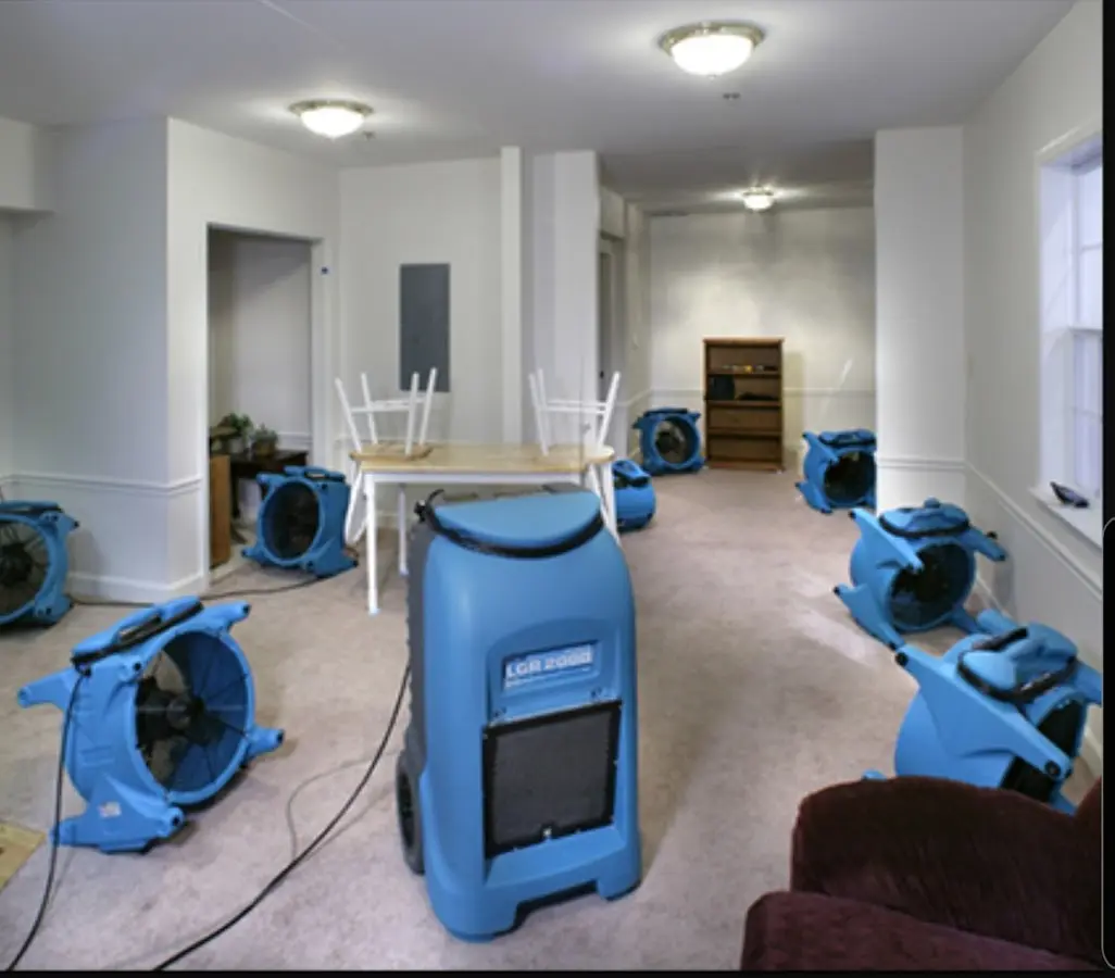 Air movers and dehumidifier setup for Water Extraction & Removal in Manor